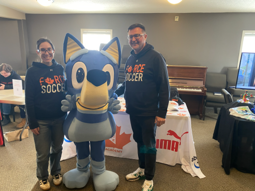 Bluey character with Force Soccer