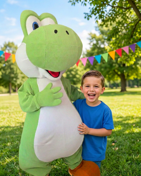 A child in a blue shirt smiles next to a large green dinosaur mascot outdoors.